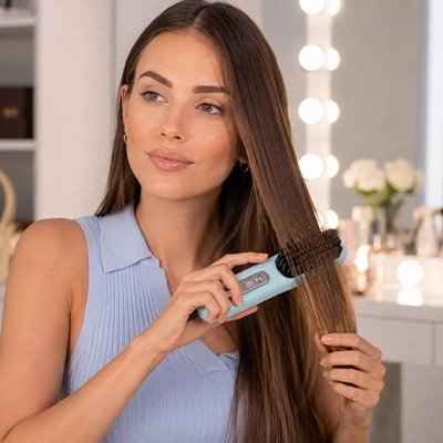 Brosse lissante chauffante action 2 en 1