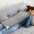 Coussin chauffant soulage les douleurs